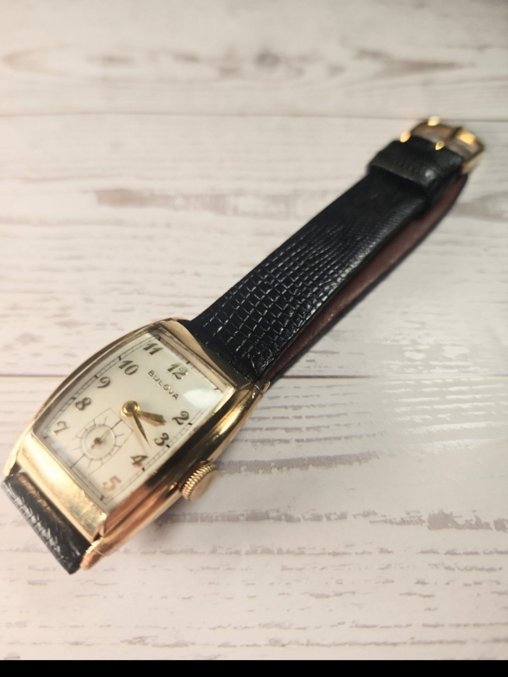 Bulova Vintage Gold-Tone Rectangular Watch with Black Leather Strap